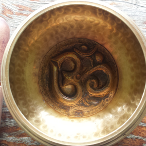 Hand hammered Om